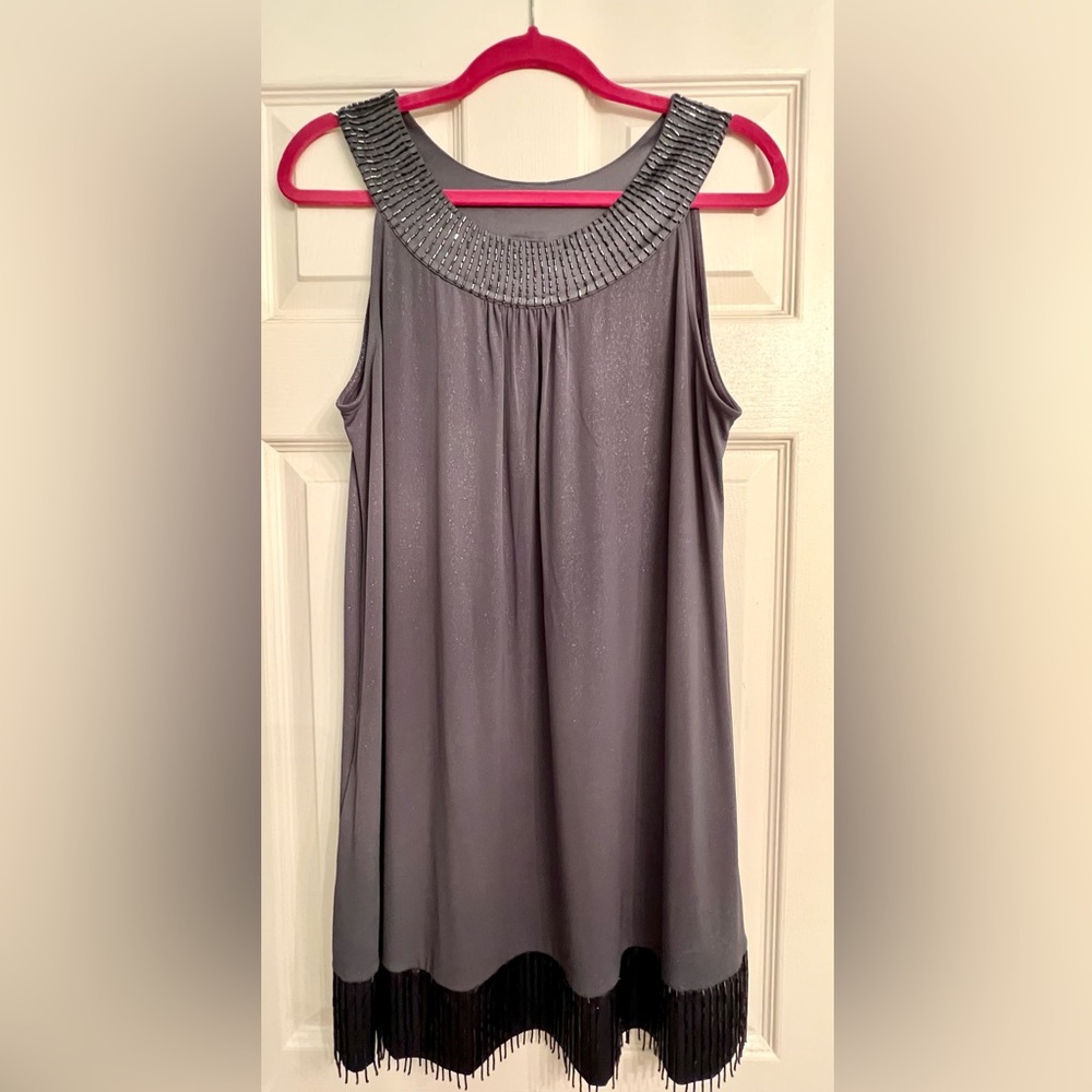 Silver shimmery dress from Express, beautiful beading along neckline and bottom.